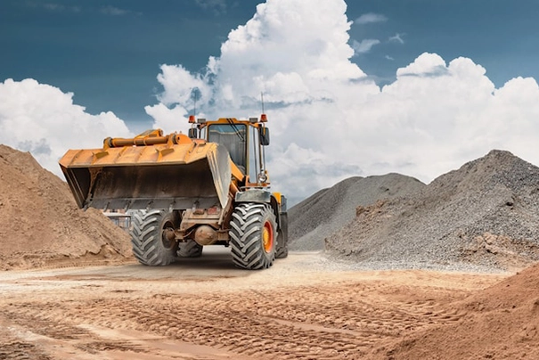 Bulldozer Moving Gravel at Excavation Site in Waco TX